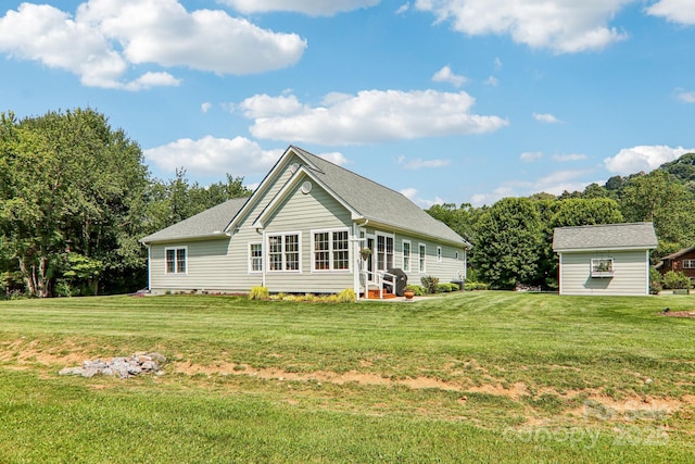 8 Amos Ct, Maggie Valley, NC 28751 - rear view of property featuring a lawn and entry steps