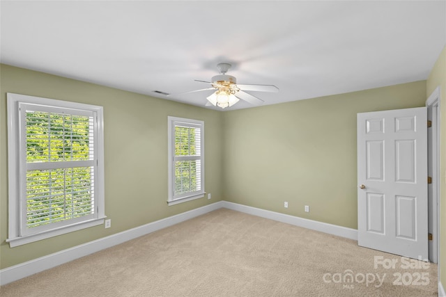 1019 Westlake Dr, Kannapolis, NC 28081 - empty room with ceiling fan and light carpet
