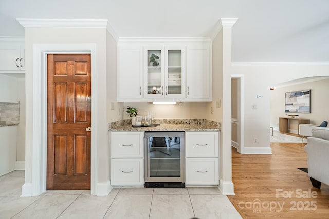 6412 Boykin Spaniel Rd, Charlotte, NC 28277 - indoor bar featuring wine cooler and crown molding