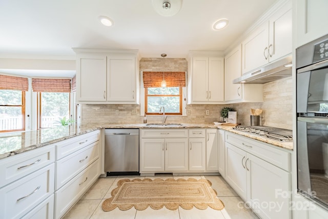 6412 Boykin Spaniel Rd, Charlotte, NC 28277 - kitchen featuring stainless steel appliances, healthy amount of natural light, and backsplash