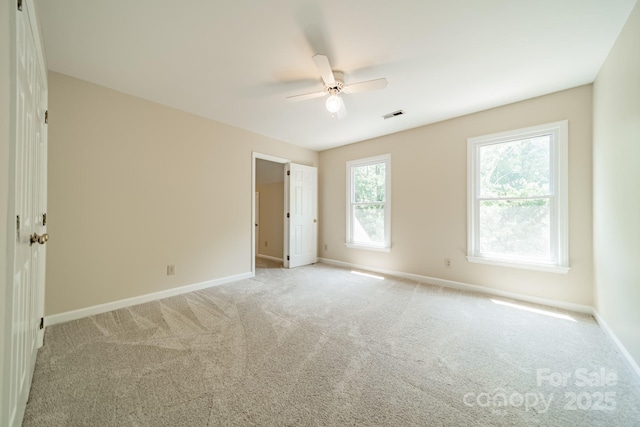 6412 Boykin Spaniel Rd, Charlotte, NC 28277 - unfurnished bedroom featuring light colored carpet and ceiling fan