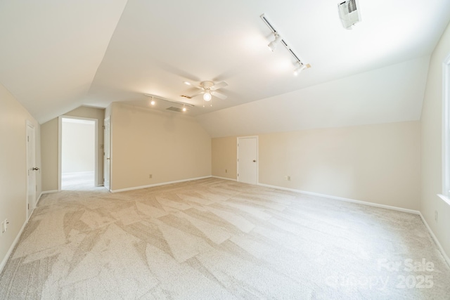 6412 Boykin Spaniel Rd, Charlotte, NC 28277 - additional living space with light colored carpet, lofted ceiling, and ceiling fan