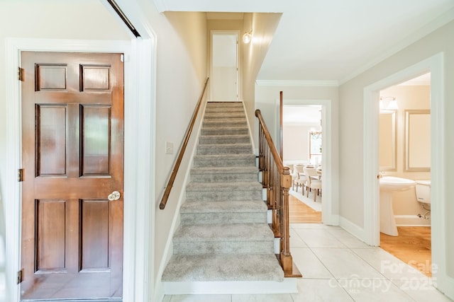 6412 Boykin Spaniel Rd, Charlotte, NC 28277 - staircase featuring crown molding and tile patterned floors