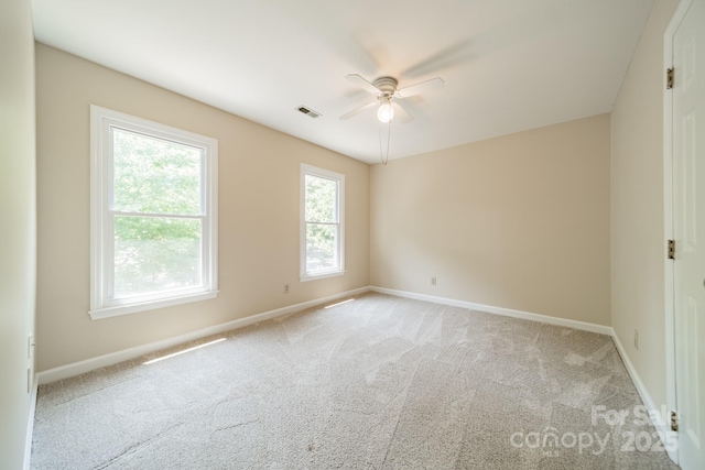 6412 Boykin Spaniel Rd, Charlotte, NC 28277 - spare room with ceiling fan and light colored carpet