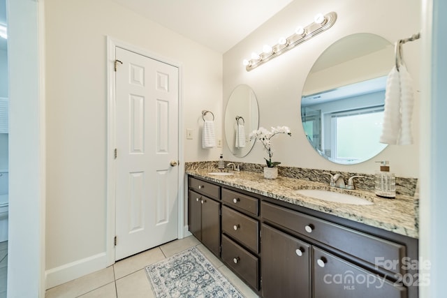 6412 Boykin Spaniel Rd, Charlotte, NC 28277 - full bathroom featuring double vanity and tile patterned floors