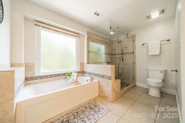 6412 Boykin Spaniel Rd, Charlotte, NC 28277 - bathroom featuring a garden tub, a shower stall, and tile patterned floors