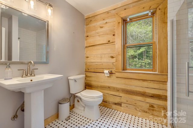 465 Youngs Gap Rd, Fletcher, NC 28732 - bathroom with wood walls and tile patterned flooring