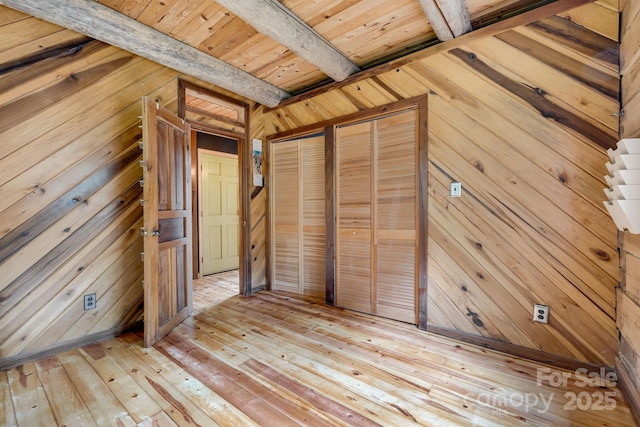 465 Youngs Gap Rd, Fletcher, NC 28732 - unfurnished bedroom with wooden walls, light wood-type flooring, and a wooden ceiling with exposed beams