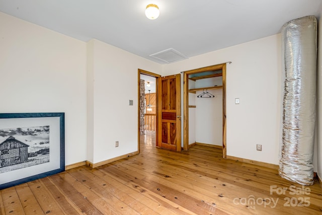 465 Youngs Gap Rd, Fletcher, NC 28732 - unfurnished room with attic access and light wood finished floors