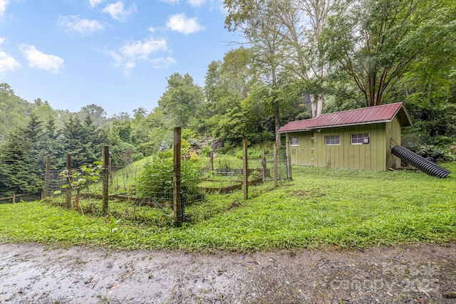 465 Youngs Gap Rd, Fletcher, NC 28732 - view of yard with a vegetable garden and a storage shed