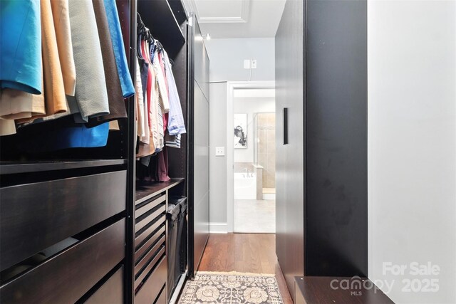 2377 Maple Grove Ln NW, Concord, NC 28027 - spacious closet with light wood finished floors