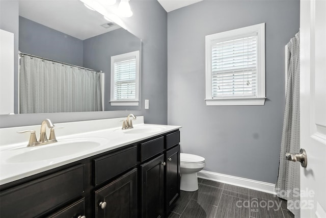 2377 Maple Grove Ln NW, Concord, NC 28027 - full bath with double vanity and baseboards