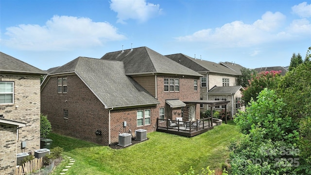 2377 Maple Grove Ln NW, Concord, NC 28027 - rear view of property featuring brick siding, a wooden deck, a yard, and a shingled roof