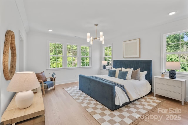 4349 Castleton Rd, Charlotte, NC 28211 - bedroom featuring light wood-style floors, a chandelier, and recessed lighting
