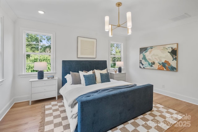 4349 Castleton Rd, Charlotte, NC 28211 - bedroom featuring a chandelier, wood finished floors, and recessed lighting