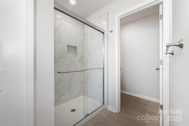 1209 Cathey Rd, Charlotte, NC 28214 - full bathroom with a marble finish shower and tile patterned floors