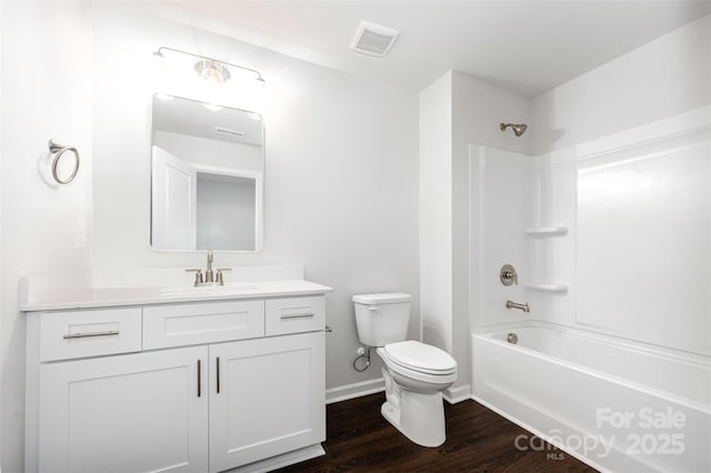 1209 Cathey Rd, Charlotte, NC 28214 - full bathroom featuring wood finished floors, vanity, and shower / bath combination