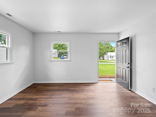 405 Jones St, Monroe, NC 28110 - entrance foyer with plenty of natural light and wood finished floors