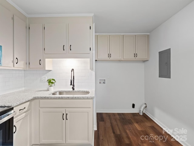 405 Jones St, Monroe, NC 28110 - laundry area featuring electric panel, hookup for a washing machine, and dark wood finished floors