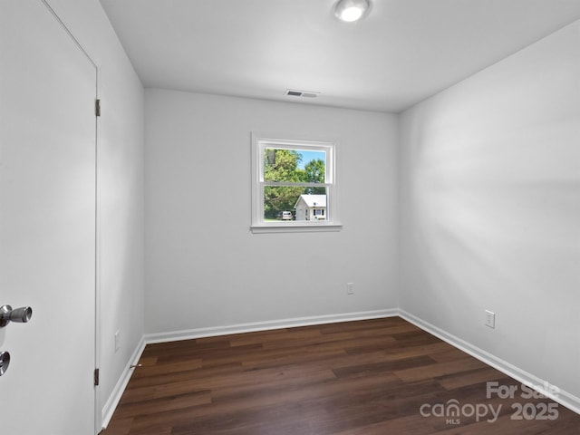 405 Jones St, Monroe, NC 28110 - unfurnished room with dark wood-style flooring