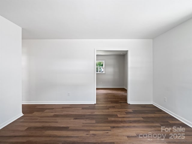 405 Jones St, Monroe, NC 28110 - spare room with dark wood finished floors