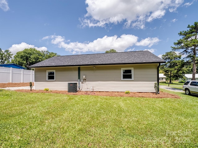 405 Jones St, Monroe, NC 28110 - view of side of property with a shingled roof and a central AC unit