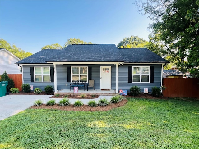 1723 Lowder St, Albemarle, NC 28001 - view of front of home with covered porch and a shingled roof