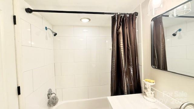 210 W Church St, Cherryville, NC 28021 - bathroom with shower / bathtub combination with curtain and vanity
