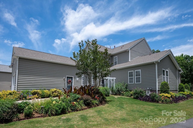 10818 Alvarado Way, Charlotte, NC 28277 - view of front facade featuring a front lawn and roof with shingles