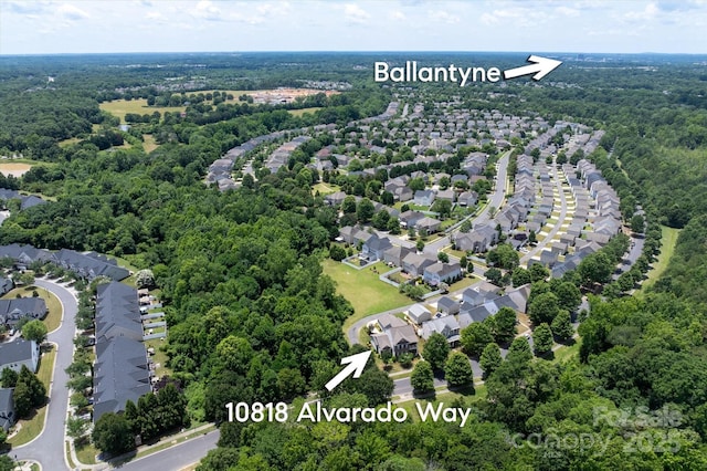 10818 Alvarado Way, Charlotte, NC 28277 - aerial perspective of suburban area with a forest