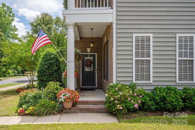 10818 Alvarado Way, Charlotte, NC 28277 - property entrance with a balcony