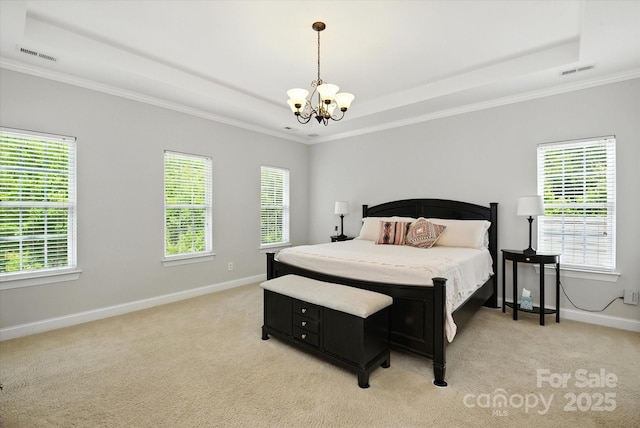 10818 Alvarado Way, Charlotte, NC 28277 - bedroom with a tray ceiling, a chandelier, crown molding, and light colored carpet