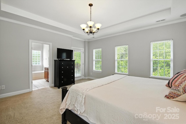 10818 Alvarado Way, Charlotte, NC 28277 - bedroom with a raised ceiling, light colored carpet, a chandelier, ornamental molding, and ensuite bath