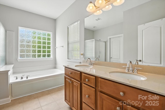 10818 Alvarado Way, Charlotte, NC 28277 - bathroom with double vanity, a bath, tile patterned flooring, and a stall shower