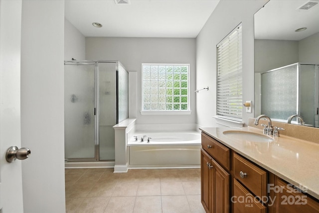 10818 Alvarado Way, Charlotte, NC 28277 - full bathroom with vanity, a stall shower, a bath, and tile patterned flooring