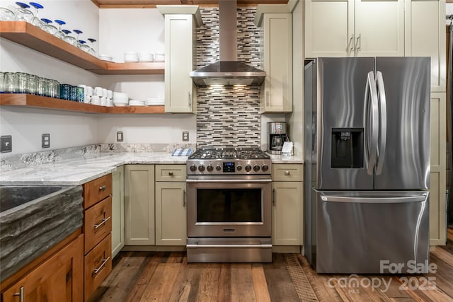1037 Newberry Creek Rd, Old Fort, NC 28762 - kitchen featuring stainless steel appliances, wall chimney range hood, tasteful backsplash, dark wood-style floors, and light stone counters