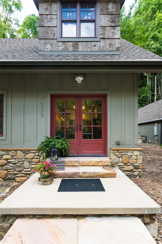 1037 Newberry Creek Rd, Old Fort, NC 28762 - property entrance featuring french doors, board and batten siding, roof with shingles, and stone siding
