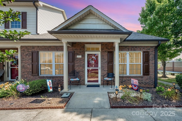 2773 Clover Rd NW, Concord, NC 28027 - view of front of property with brick siding and covered porch