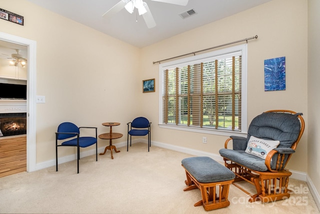 2773 Clover Rd NW, Concord, NC 28027 - living area with ceiling fan, carpet floors, and healthy amount of natural light
