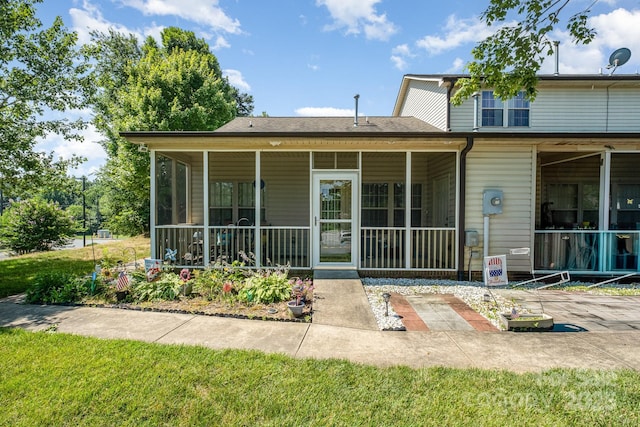 2773 Clover Rd NW, Concord, NC 28027 - rear view of house featuring a sunroom