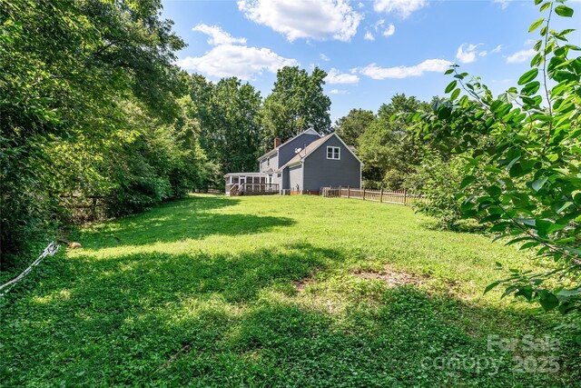 1581 Bluff Ct, Rock Hill, SC 29732 - view of yard with a wooden deck and a wooded view