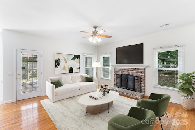 1581 Bluff Ct, Rock Hill, SC 29732 - living area with wood finished floors, a fireplace, and a ceiling fan