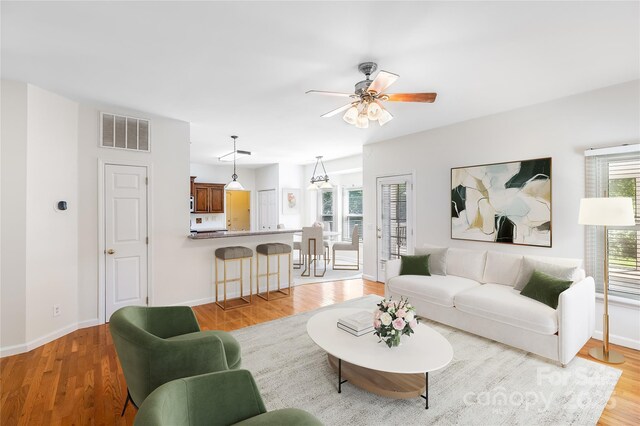 1581 Bluff Ct, Rock Hill, SC 29732 - living area featuring ceiling fan and light wood-style flooring
