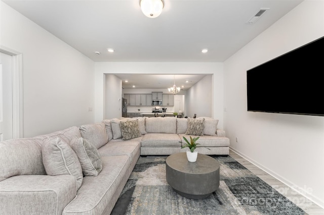 5010 Arbordale Way, Mount Holly, NC 28120 - living area with light wood-type flooring, a chandelier, and recessed lighting