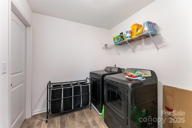 5010 Arbordale Way, Mount Holly, NC 28120 - laundry room with washing machine and dryer and wood finished floors