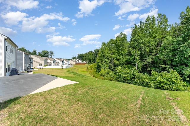 5010 Arbordale Way, Mount Holly, NC 28120 - view of grassy yard featuring a residential view and a patio