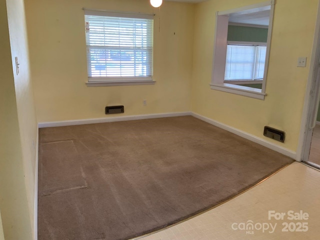 3009 Grier St, Newton, NC 28658 - empty room with baseboards and carpet floors