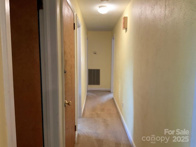 3009 Grier St, Newton, NC 28658 - corridor featuring light colored carpet and baseboards
