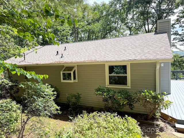 123 Avondale Ridge Rd, Asheville, NC 28803 - view of side of home with a chimney and roof with shingles