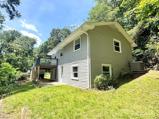 123 Avondale Ridge Rd, Asheville, NC 28803 - view of property exterior featuring a deck and a lawn